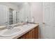 Well-maintained bathroom with double sinks and ample counter space, making it perfect for busy mornings at 6296 W Prentice Ave, Littleton, CO 80123