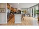 Spacious kitchen with stainless steel appliances, granite countertops and a dining area at 6296 W Prentice Ave, Littleton, CO 80123