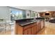 Gourmet kitchen with stainless steel appliances, granite countertops and hardwood floors at 6296 W Prentice Ave, Littleton, CO 80123