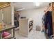 Spacious walk-in closet featuring custom shelving and ample storage space for clothing and accessories at 6296 W Prentice Ave, Littleton, CO 80123