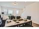 Open-concept space with dining area and a glimpse of a cozy living room at 370 Geneva St, Aurora, CO 80010
