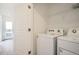 Functional laundry room equipped with a modern washer and dryer at 370 Geneva St, Aurora, CO 80010