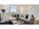 Inviting living room showcasing a comfortable sectional sofa and stylish decor at 370 Geneva St, Aurora, CO 80010
