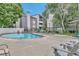 Serene pool with lounge seating presents a refreshing oasis for relaxation on warm days at 9797 E Peakview Ave # C1, Englewood, CO 80111