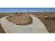 Concrete community walking path surrounded by newly planted trees at 42964 Colonial Trl, Elizabeth, CO 80107