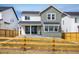 Inviting two-story home featuring a fenced-in backyard, and covered patio at 16568 W 92Nd Pl, Arvada, CO 80007