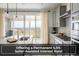 Modern kitchen features stainless steel appliances, gray cabinets, and a view of the community lake at 16568 W 92Nd Pl, Arvada, CO 80007