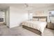 Bright and airy bedroom featuring neutral tones, art, and ample space, perfect for relaxation at 16568 W 92Nd Pl, Arvada, CO 80007