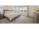Serene main bedroom with lots of light, neutral decor, and a spacious feel at 16568 W 92Nd Pl, Arvada, CO 80007