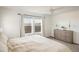 Bright bedroom featuring a cozy bed, a dresser, and a window view, great natural light at 16568 W 92Nd Pl, Arvada, CO 80007