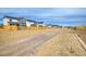Street view of a neighborhood featuring modern homes with a walking path at 16568 W 92Nd Pl, Arvada, CO 80007
