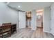 Basement space with desk, laundry area, and a bathroom with a white vanity at 5534 S Wenatchee St, Aurora, CO 80015