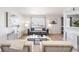 Bright living room featuring contemporary decor, plush seating, and stylish accents creating an inviting atmosphere at 1476 W Dakota Ave, Denver, CO 80223