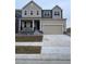 Charming two-story home with a two-car garage and covered porch, inviting curb appeal at 5621 W 141St Ln, Broomfield, CO 80020