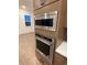 A modern kitchen with stainless steel KitchenAid oven and microwave at 5621 W 141St Ln, Broomfield, CO 80020