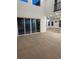 Bright, open living space featuring wood floors, tall windows, and sliding glass doors at 5621 W 141St Ln, Broomfield, CO 80020