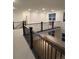 A loft featuring black metal railing overlooking the home at 5621 W 141St Ln, Broomfield, CO 80020