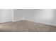 Neutral bedroom with carpet and a closet at 12635 E Pacific Cir # A, Aurora, CO 80014