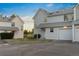 Charming townhome with attached garage, manicured lawn, and inviting curb appeal at 12635 E Pacific Cir # A, Aurora, CO 80014