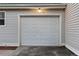 Attached one car garage with automatic door and exterior light at 12635 E Pacific Cir # A, Aurora, CO 80014