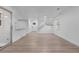 Open-concept area featuring a well-lit stairway, large windows, and sliding door access at 12635 E Pacific Cir # A, Aurora, CO 80014