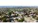 An aerial view shows this neighborhood with tree-lined streets and houses at 111 S Hudson St, Denver, CO 80246
