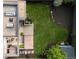 Aerial view of backyard with lawn, patio with outdoor furniture, and beautiful landscaping at 111 S Hudson St, Denver, CO 80246