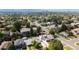 This aerial view shows the tree-lined streets of this neighborhood at 111 S Hudson St, Denver, CO 80246