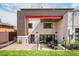 An elegant outdoor space offers a patio, dining area, and manicured yard for outdoor living at 111 S Hudson St, Denver, CO 80246