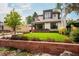 Well manicured lawn and landscaping complement this home's modern design at 111 S Hudson St, Denver, CO 80246