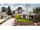 Charming home featuring a well-manicured lawn and beautiful landscaping at 111 S Hudson St, Denver, CO 80246