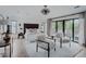 Spacious main bedroom showcasing patio access, contemporary furnishings, and a modern lighting fixture at 111 S Hudson St, Denver, CO 80246