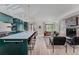 Bright open-concept living space with kitchen, living and dining areas and hardwood floors at 111 S Hudson St, Denver, CO 80246