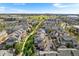 Aerial view showcasing a well-planned community with green spaces and modern architecture at 85 Uinta Way # 603, Denver, CO 80230