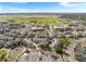 Bird's eye view of a landscaped community with playgrounds, parking, and a vast green space at 85 Uinta Way # 603, Denver, CO 80230