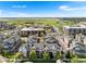 The neighborhood has townhouses and green spaces, creating a warm and inviting atmosphere at 85 Uinta Way # 603, Denver, CO 80230