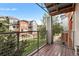 Balcony overlooking a well-maintained green space at 85 Uinta Way # 603, Denver, CO 80230