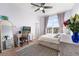 Bright bedroom featuring a desk area, and a large window with natural light at 85 Uinta Way # 603, Denver, CO 80230