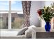 Bright bedroom featuring natural light, a window with curtains and decor at 85 Uinta Way # 603, Denver, CO 80230