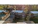 An aerial view of the townhome with a large, fenced back yard and detached garage at 1272 S Crystal Way, Aurora, CO 80012