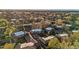 High-angle view of a neighborhood with tree-lined streets and well-kept homes, showcasing the community's appeal at 1272 S Crystal Way, Aurora, CO 80012