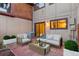 Inviting back patio with outdoor seating, perfect for relaxing and entertaining guests with brick pavers at 1272 S Crystal Way, Aurora, CO 80012
