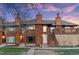 Beautiful townhouse exterior with wood siding and an inviting entryway at 1272 S Crystal Way, Aurora, CO 80012