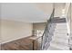 Open living room boasts hardwood floors, natural light, and stairs to the second floor at 1272 S Crystal Way, Aurora, CO 80012