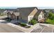 Exterior of community clubhouse with stone accents and well-maintained landscaping at 12604 Madison Way, Thornton, CO 80241