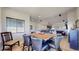Open dining area provides seamless flow to the kitchen and living spaces, ideal for entertaining at 12604 Madison Way, Thornton, CO 80241