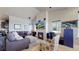 Cozy living room features a fireplace, vaulted ceiling, and comfortable seating, creating a welcoming atmosphere at 12604 Madison Way, Thornton, CO 80241