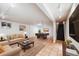 Finished basement with tile flooring, a cozy seating area, and a billiard table at 7382 E Bates Dr, Denver, CO 80231