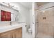 Modern bathroom with a sleek vanity, updated fixtures, and glass shower at 7382 E Bates Dr, Denver, CO 80231