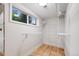 Well-lit closet with wire shelving for optimal organization at 7382 E Bates Dr, Denver, CO 80231